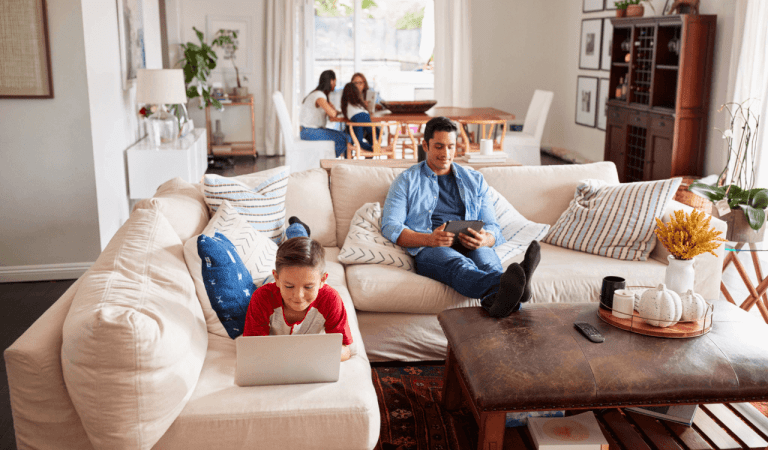 A family at home enjoying Truespeed's ultrafast broadband and wi-fi